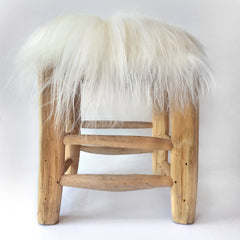 white fur stool cover