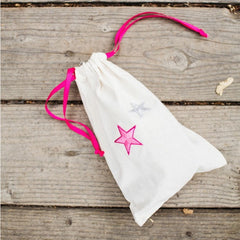muslin bag with embroidered stars