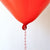 10 red and black balloons 