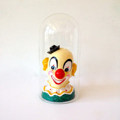 clown vintage figurine with glass case